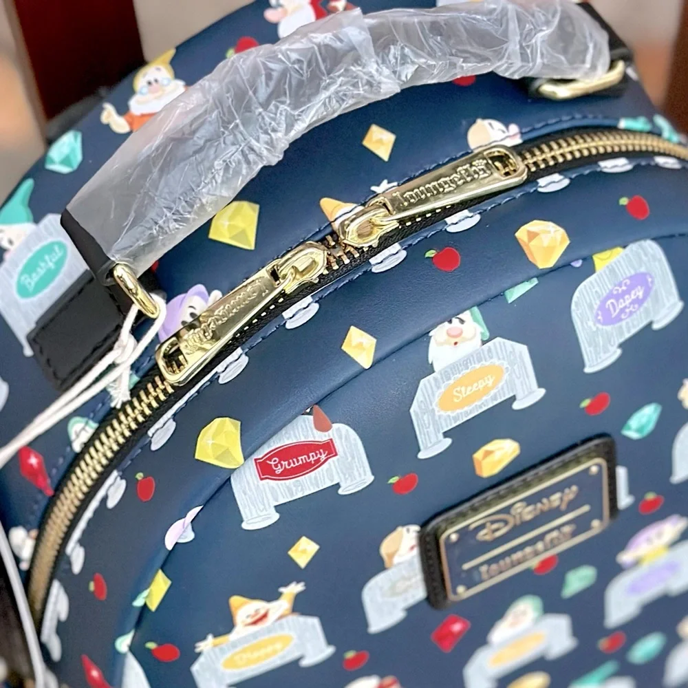 Loungefly Disney Snow White and the Seven Dwarves Allover Print Mini Backpack